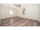 Bright, neutral bedroom with modern ceiling fan and window at 248 Robin Rd, Altamonte Springs, FL 32701