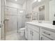 Bright, elegant bathroom with a glass shower and a marble vanity at 2729 Timbergrove St, St Cloud, FL 34771