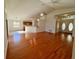 Spacious living room with hardwood floors and ample natural light at 2801 Hardenbergh Ln, Eustis, FL 32726