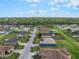 Bird's-eye view of the house, emphasizing the backyard, nearby street, and general layout of the neighborhood at 2851 Stonewood Cir, Lakeland, FL 33810