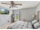 A bedroom with a ceiling fan and a window with blinds at 2851 Stonewood Cir, Lakeland, FL 33810