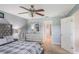 Bedroom features walk-in closet and a view of an en-suite bathroom at 2851 Stonewood Cir, Lakeland, FL 33810