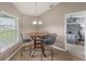 Breakfast nook with table and chairs, light fixture and view of bedroom at 2851 Stonewood Cir, Lakeland, FL 33810