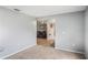 Neutral room featuring tile, natural lighting and a partial view of living room furniture at 2851 Stonewood Cir, Lakeland, FL 33810