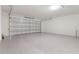 A spacious garage with a finished floor, ready for parking and storage at 304 Towns Cir, Haines City, FL 33844