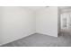 Unfurnished bedroom with neutral carpet and an open, airy ambiance at 3483 Salvia Ct, Tavares, FL 32778