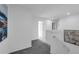 Upstairs landing with carpet and white doors leading to various rooms in the home at 3489 Salvia Ct, Tavares, FL 32778