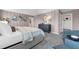 Bright and spacious main bedroom with sitting area and an en-suite bathroom at 3489 Salvia Ct, Tavares, FL 32778