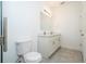 Bathroom featuring a dual sink vanity, a marble tiled shower, and tile floors at 3892 Sw 130Th Loop, Ocala, FL 34473