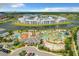 Extensive aerial shot showing modern apartments, a water park, and a scenic lake at 4865 Clock Tower Dr, Kissimmee, FL 34746