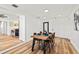 Inviting dining room featuring a wooden table, stylish chairs, and neutral decor at 7416 Kadel Way, Orlando, FL 32822