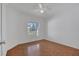 Bedroom with a ceiling fan and bright natural light shining through the window at 8630 Fort Jefferson Blvd, Orlando, FL 32822