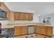 Well-lit kitchen featuring ample counter space and stainless steel appliances at 8630 Fort Jefferson Blvd, Orlando, FL 32822