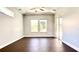 Living room with wood floors and lots of natural light at 8854 Oak Landings Ct, Orlando, FL 32836