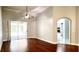 Bright living room with hardwood floors and sliding glass doors at 8854 Oak Landings Ct, Orlando, FL 32836