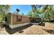 Exterior view of a single-story home featuring a large screened-in porch at 20144 Se 156Th St, Umatilla, FL 32784