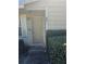 Inviting front door entrance of home with well-maintained landscaping at 1168 Woodman Way, Orlando, FL 32818