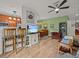 Bright living space with a view of the kitchen, dining area, and comfortable furnishings at 1206 Bella Cara Ct, Davenport, FL 33896