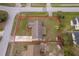 Aerial view of the home showcasing the lot size, landscaping, driveway and backyard shed at 147 13Th Ave, Longwood, FL 32750