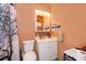 Functional bathroom featuring a vanity with a sink, toilet, and a shower with a curtain at 147 13Th Ave, Longwood, FL 32750