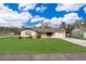 Charming single-story home features a manicured lawn, driveway, and inviting front entry at 147 13Th Ave, Longwood, FL 32750