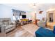 Cozy living room with wood floors, neutral paint, and bright natural light at 147 13Th Ave, Longwood, FL 32750