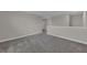 Neutral bedroom featuring a gray carpet at 1616 Oak Blossom Dr, Davenport, FL 33837