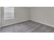 Bedroom featuring a window and gray carpet at 1616 Oak Blossom Dr, Davenport, FL 33837