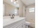 This bathroom offers a shower-tub combo and single sink vanity at 1644 Piccadilly Dr, Daytona Beach, FL 32117