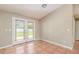 Dining area with tile flooring and access to the backyard through French doors at 1644 Piccadilly Dr, Daytona Beach, FL 32117