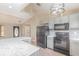 Bright kitchen featuring stainless steel appliances, tile backsplash, and modern lighting at 1644 Piccadilly Dr, Daytona Beach, FL 32117