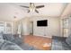 Open concept living room boasting tile floors and a ceiling fan at 1644 Piccadilly Dr, Daytona Beach, FL 32117