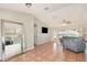 Open living area with tile floors, sofa, and television at 1644 Piccadilly Dr, Daytona Beach, FL 32117