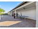Enjoy the shaded community patio with ping pong, ceiling fans, and comfortable lounge chairs for outdoor recreation at 16613 Caribbean Breeze Way # 34714, Clermont, FL 34714