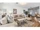 Bright living room with comfortable seating and view to an open floor plan at 16613 Caribbean Breeze Way # 34714, Clermont, FL 34714