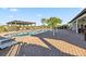 Resort-style community pool with poolside pergola and plenty of seating, perfect for relaxing and socializing at 16613 Caribbean Breeze Way # 34714, Clermont, FL 34714