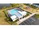 Aerial view of the community pool, playground, and clubhouse amenities at 171 Bogey Dr, Davenport, FL 33896