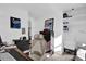 Bedroom with built-in shelving and natural light offers a versatile space for work or relaxation at 1868 Wayside Dr, Orlando, FL 32818