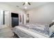This bedroom offers a comfortable bed, bathroom access, and neutral colors, perfect for relaxation at 1959 9Th Ave, Deland, FL 32724