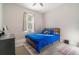Cozy bedroom with a comfy bed, soft lighting, and a neutral color palette for relaxation at 1959 9Th Ave, Deland, FL 32724