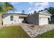 Charming single-story home with a well-manicured front yard and inviting entrance at 1959 9Th Ave, Deland, FL 32724