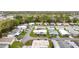 Aerial view of a neighborhood featuring homes, street layouts, and vibrant community living at 200 Patricia Pl, Davenport, FL 33897