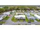 Enjoy community living from above, highlighting the homes, green spaces and convenient street layouts at 200 Patricia Pl, Davenport, FL 33897