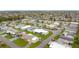 An aerial view of the community shows many homes in the neighborhood at 200 Patricia Pl, Davenport, FL 33897