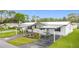 This home offers covered parking, lush flower garden and a pristine landscape in a friendly neighborhood at 200 Patricia Pl, Davenport, FL 33897