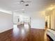 Bright and spacious living room with beautiful wood floors and neutral walls at 200 Patricia Pl, Davenport, FL 33897