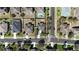 Aerial view of a corner lot home with a pool, driveway, and residential street at 2005 Blackbird Dr, Apopka, FL 32703