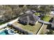 Aerial view of a home featuring a fenced yard, solar panels, and a pool at 2005 Blackbird Dr, Apopka, FL 32703