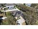 Overhead view highlighting solar panels, a spacious driveway, and a well-maintained yard at 2005 Blackbird Dr, Apopka, FL 32703