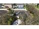 Aerial view showcasing solar panels, privacy fence, and swimming pool at 2005 Blackbird Dr, Apopka, FL 32703